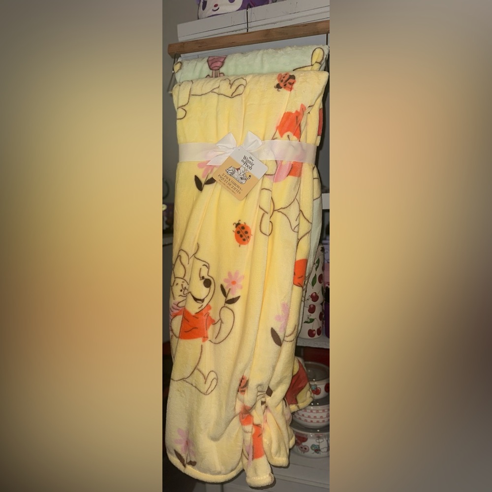 Winnie the Pooh & friends 2 pack throw blankets.